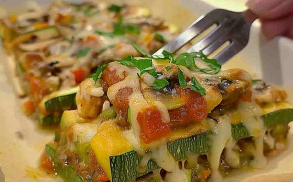 Zucchini mit Käse und Champignons