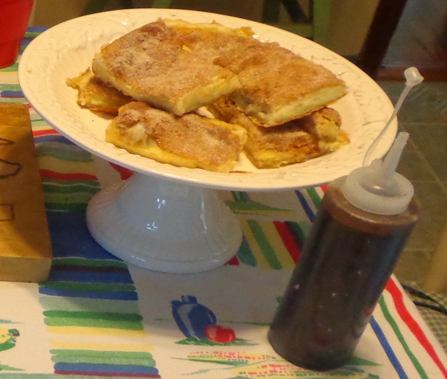 Churros Cheesecake s čokoládovým sirupem